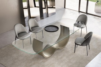 MISTRAL, grande table de repas design plateau en verre cristal piètement métal platine brossé