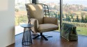 BELAMYENCAGE fauteuil design pivotant sanglé treillis de cuir