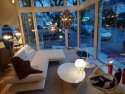 Table basse ovale design BABY.T plateau laqué blanc, base chromée brillante